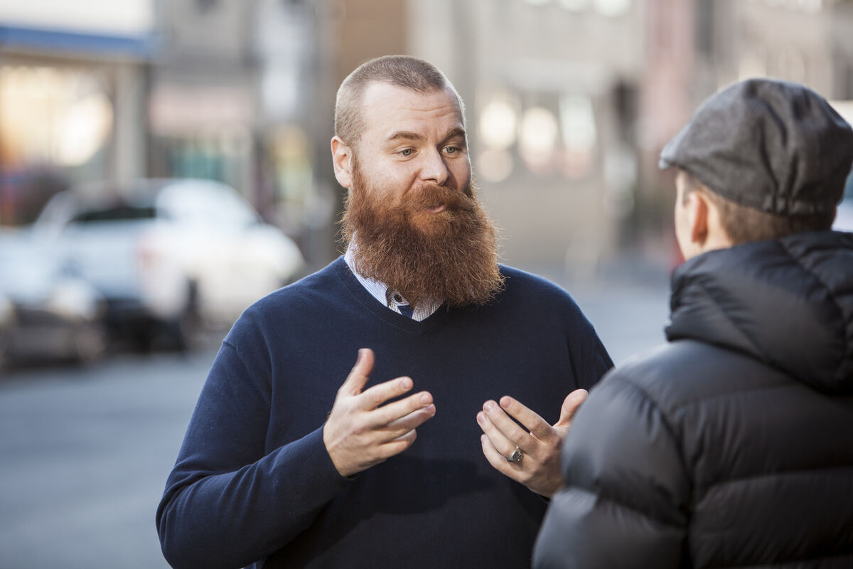 Two men having a conversation in Auslan